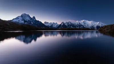 mount mont blanc covered snow reflecting water evening chamonix france